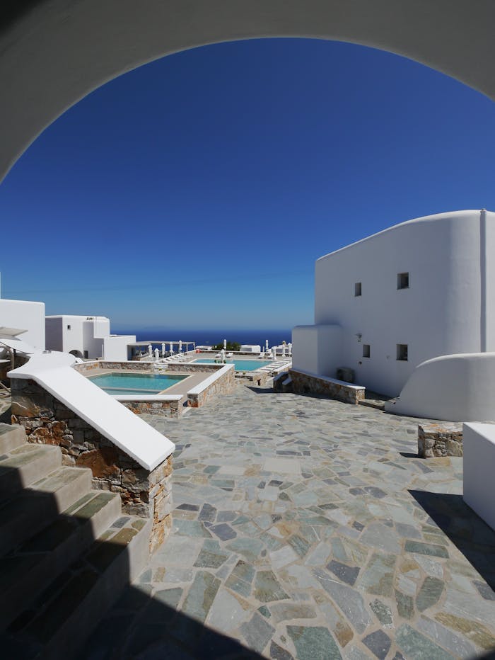 pexels photo 30189693 2 Beautiful Cycladic architecture with a sea view under clear blue skies.