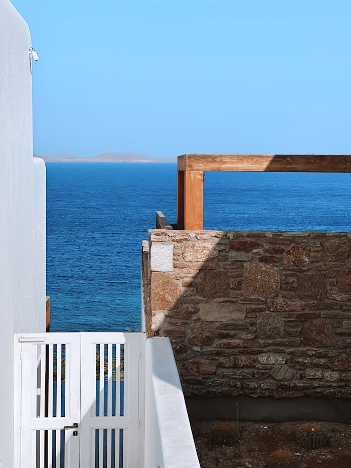 pexels photo 32727470 Peaceful view of the Mediterranean Sea from a Greek island with traditional architecture.